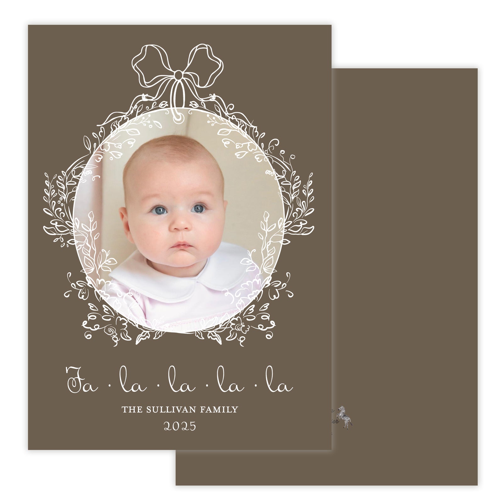 Baby photo card with decorative elements and text on a brown background