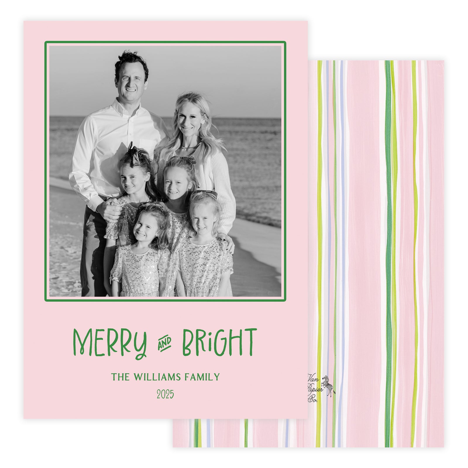 Holiday card with family photo and 'Merry and Bright' text on a pink background