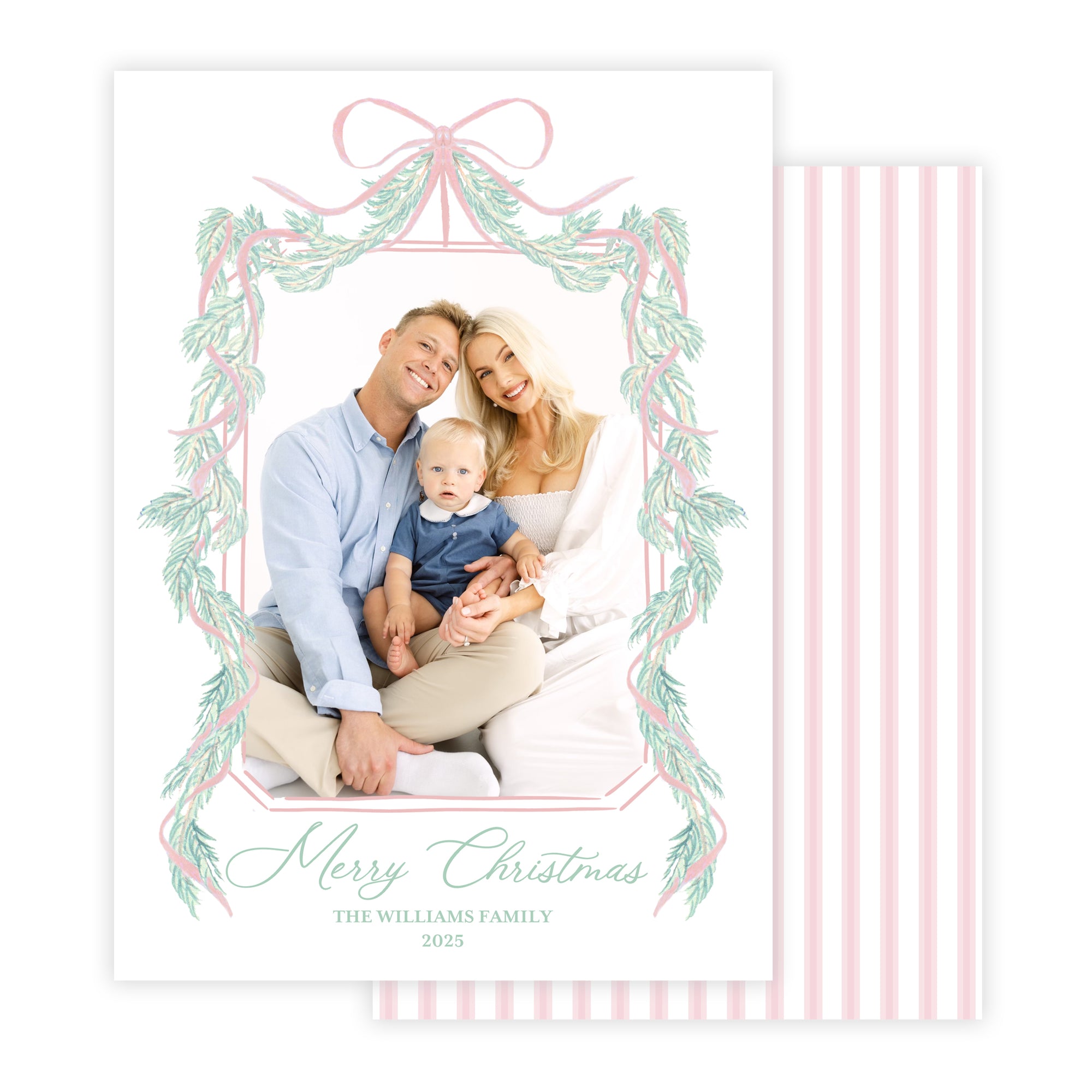 Christmas card with a family photo and decorative garland border.