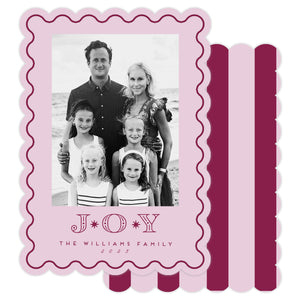 Christmas photo on a card with 'JOY' and die cut scalloped border.