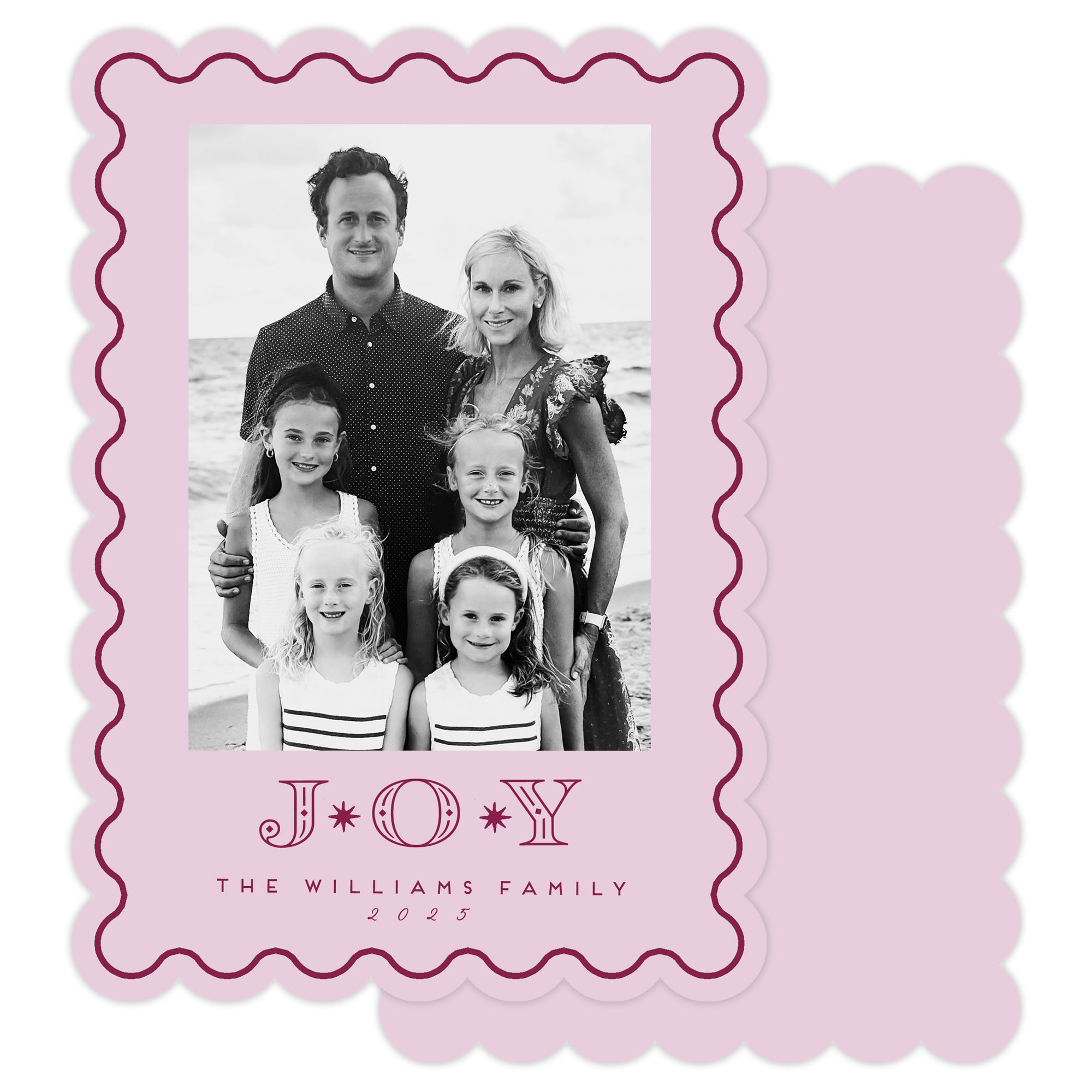 Family photo with 'JOY' text on a pink scalloped die cut border