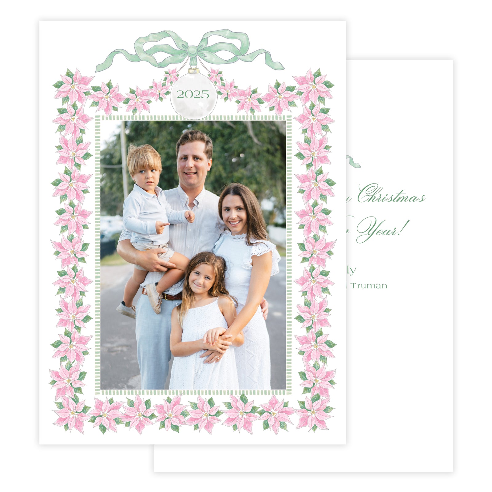 Christmas card with a family photo with decorative floral poinsettia frame and text on a white background.