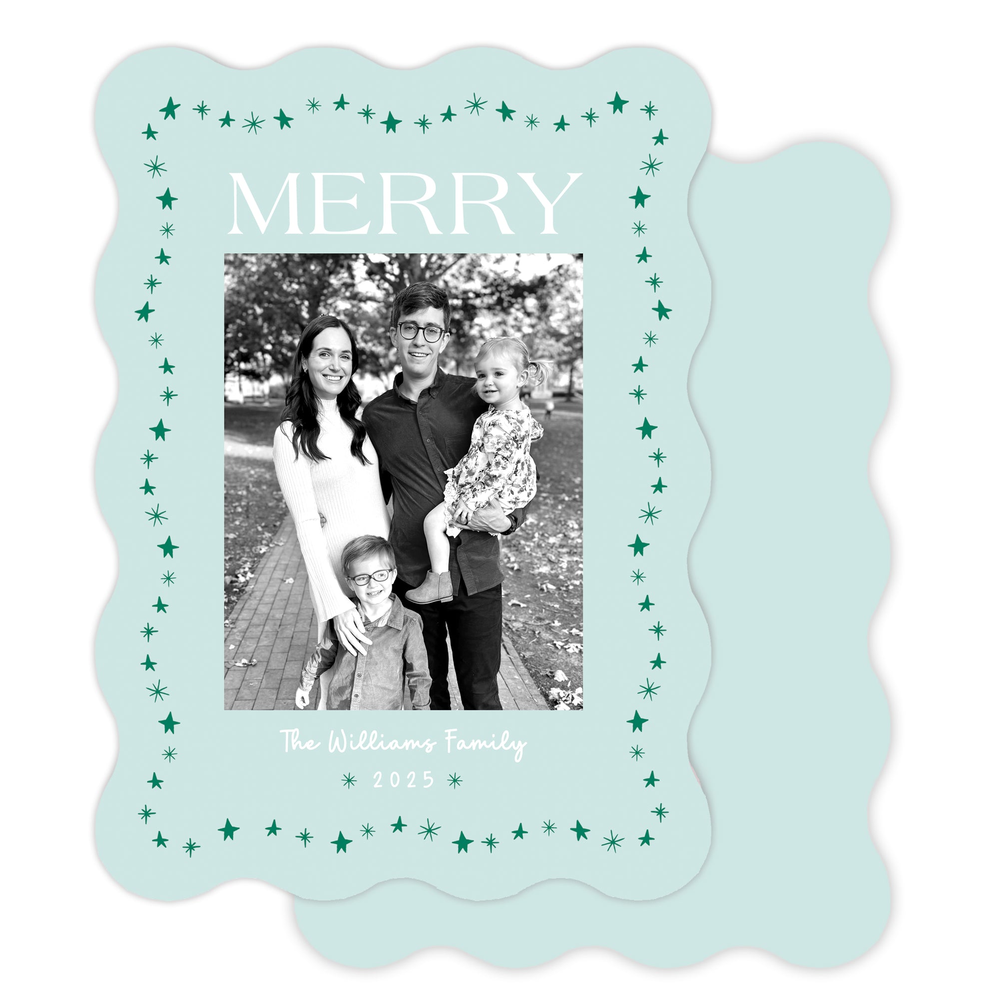 Christmas card with a family photo and 'Merry' text on a light blue background