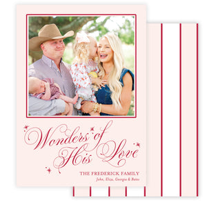 Family photo with 'Wonders of His Love' text on a pink card